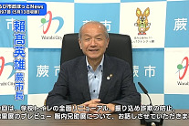 写真:インタビューを行う市長